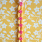 Armband FLOWER POWER mit Blumen - verschiedene Farben - Knotwork orange